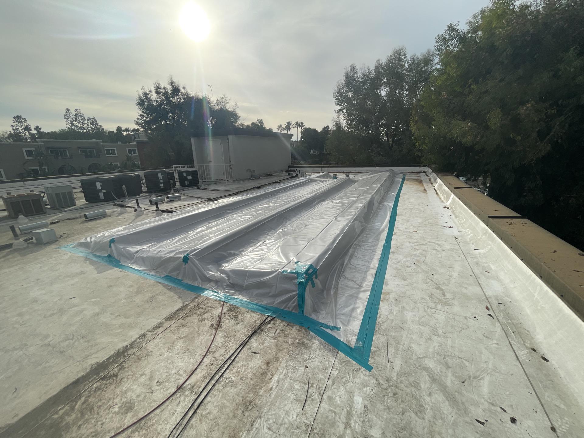 Containment set up on a multifamily rooftop