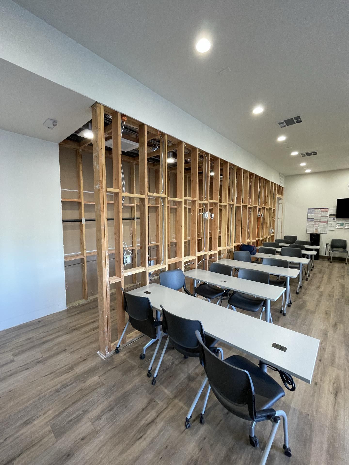 Photo of a conference room under construction during a tenant improvement project for a local municipality.