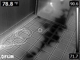 Infrared image of moisture beneath flooring